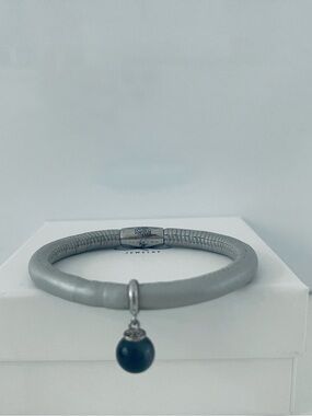NEW Jennifer Lopez new Leather bracelet with silver dangling charm grey stone.